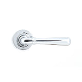 This is an image showing From The Anvil - Polished Chrome Newbury Lever on Rose Set (Plain) available from trade door handles, quick delivery and discounted prices
