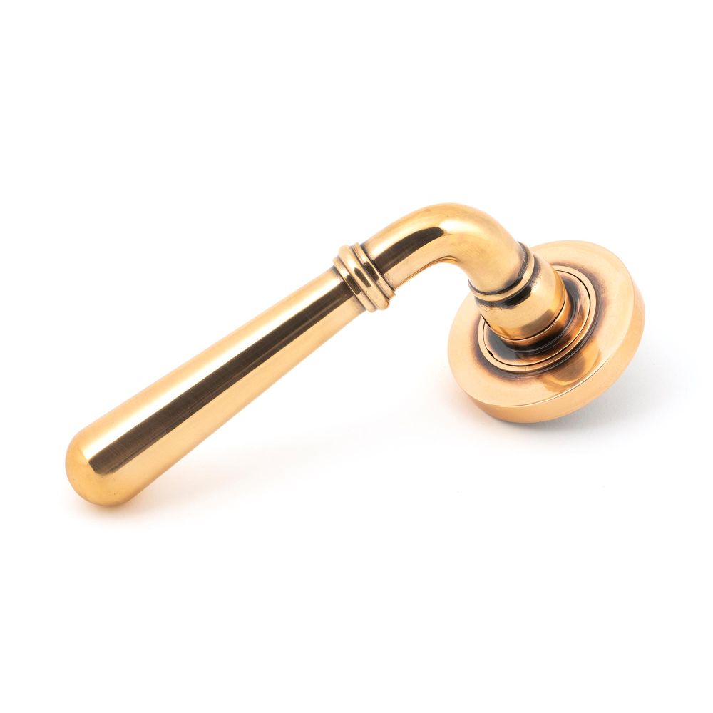 This is an image showing From The Anvil - Polished Bronze Newbury Lever on Rose Set (Plain) available from trade door handles, quick delivery and discounted prices