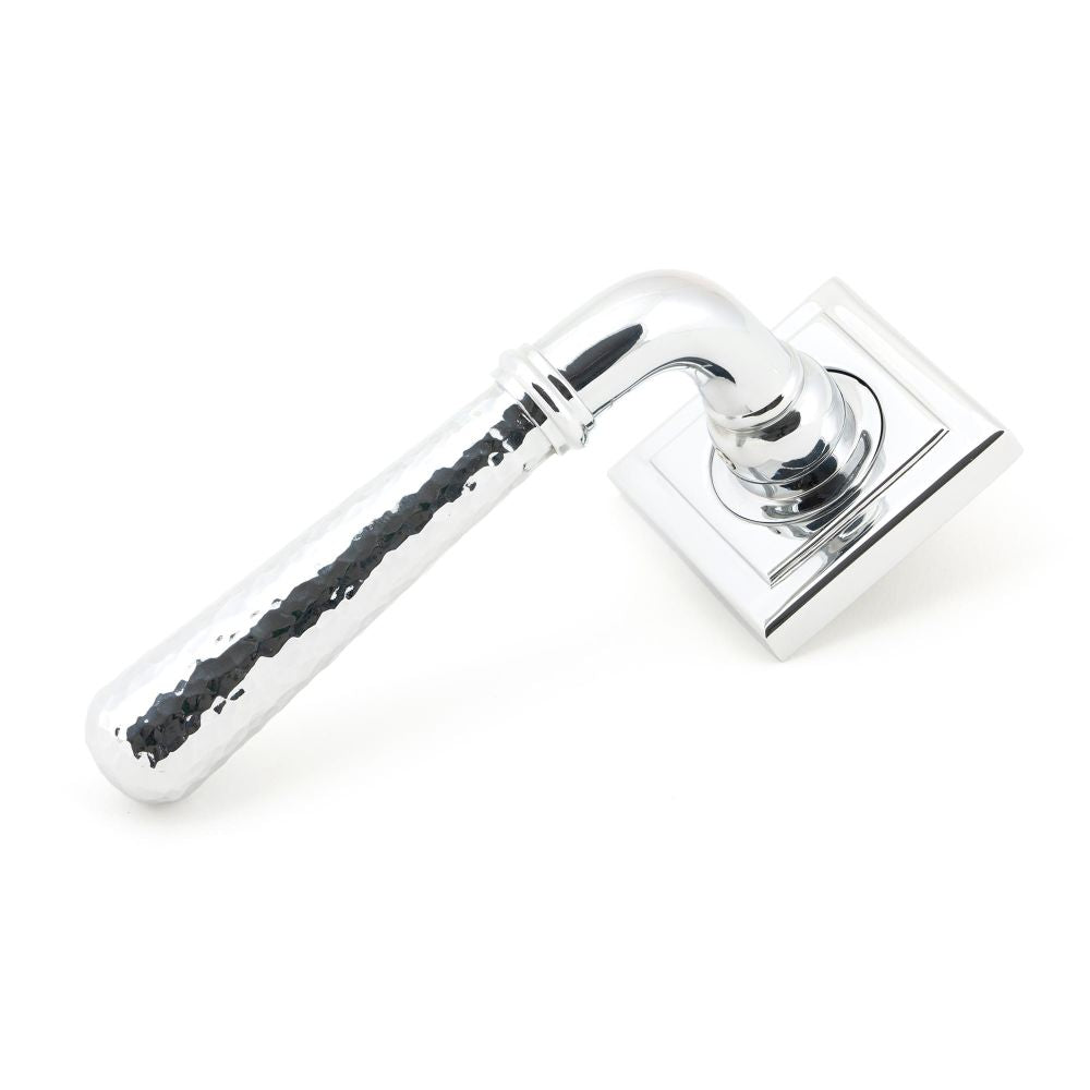 This is an image showing From The Anvil - Pol. Chrome Hammered Newbury Lever on Rose Set (Square) available from trade door handles, quick delivery and discounted prices