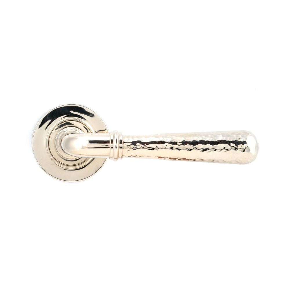 This is an image showing From The Anvil - Pol. Nickel Hammered Newbury Lever on Rose Set (Plain) available from trade door handles, quick delivery and discounted prices
