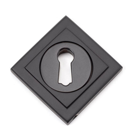 This is an image showing From The Anvil - Aged Bronze Round Escutcheon (Square) available from trade door handles, quick delivery and discounted prices