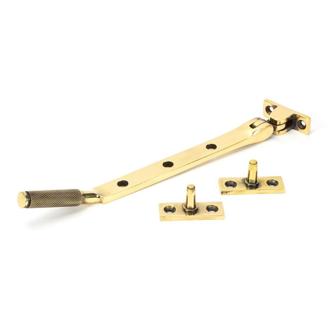 This is an image showing From The Anvil - Aged Brass 8" Brompton Stay available from trade door handles, quick delivery and discounted prices