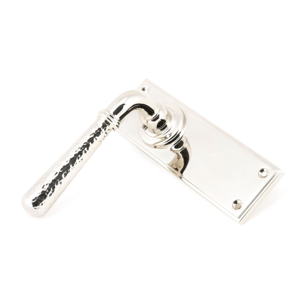 This is an image showing From The Anvil - Polished Nickel Hammered Newbury Lever Latch Set available from trade door handles, quick delivery and discounted prices