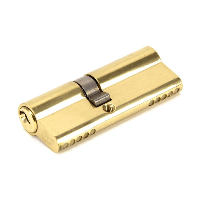 This is an image showing From The Anvil - Lacquered Brass 35/45 5pin Euro Cylinder KA available from trade door handles, quick delivery and discounted prices