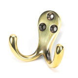 This is an image showing From The Anvil - Aged Brass Celtic Double Robe Hook available from trade door handles, quick delivery and discounted prices