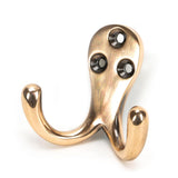 This is an image showing From The Anvil - Polished Bronze Celtic Double Robe Hook available from trade door handles, quick delivery and discounted prices