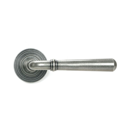 This is an image showing From The Anvil - Pewter Newbury Lever on Rose Set (Beehive) available from trade door handles, quick delivery and discounted prices