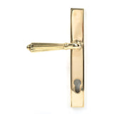 This is an image showing From The Anvil - Polished Brass Hinton Slimline Lever Espag. Lock Set available from trade door handles, quick delivery and discounted prices