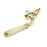 This is an image showing From The Anvil - Polished Brass Hinton Espag - RH available from trade door handles, quick delivery and discounted prices