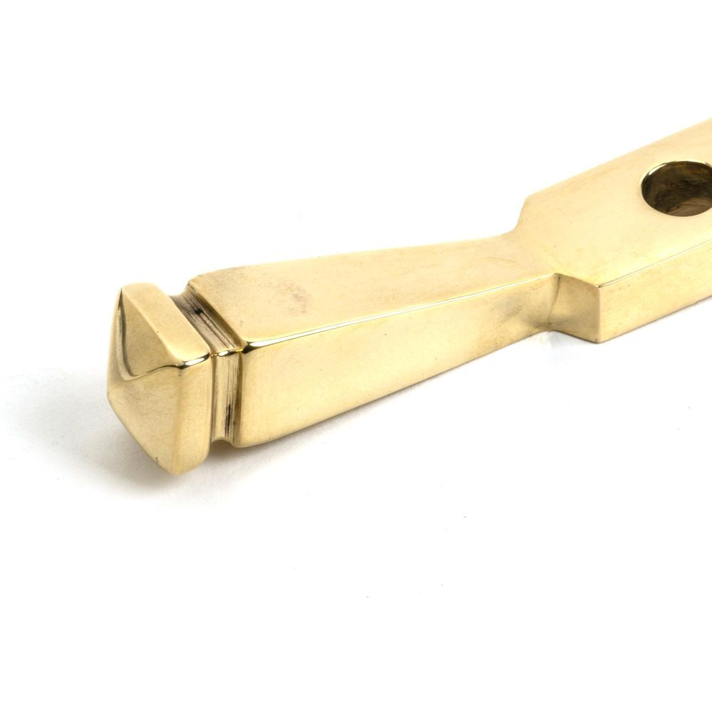 This is an image showing From The Anvil - Polished Brass 10" Avon Stay available from trade door handles, quick delivery and discounted prices