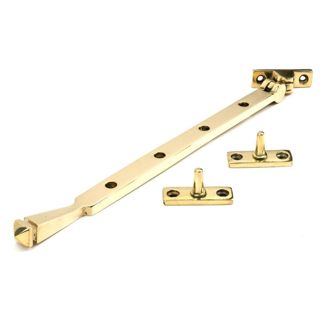 This is an image showing From The Anvil - Polished Brass 12" Avon Stay available from trade door handles, quick delivery and discounted prices