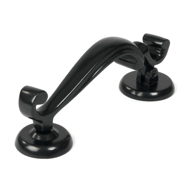 This is an image showing From The Anvil - Black Doctors Door Knocker available from trade door handles, quick delivery and discounted prices
