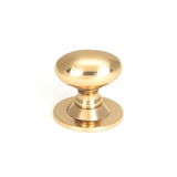 This is an image showing From The Anvil - Polished Bronze Oval Cabinet Knob 40mm available from trade door handles, quick delivery and discounted prices