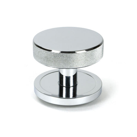 This is an image showing From The Anvil - Polished Chrome Brompton Centre Door Knob (Plain) available from trade door handles, quick delivery and discounted prices