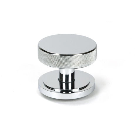 This is an image showing From The Anvil - Polished Chrome Brompton Centre Door Knob (Art Deco) available from trade door handles, quick delivery and discounted prices