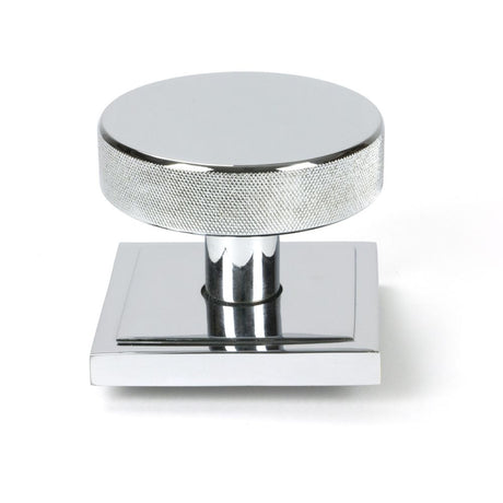 This is an image showing From The Anvil - Polished Chrome Brompton Centre Door Knob (Square) available from trade door handles, quick delivery and discounted prices