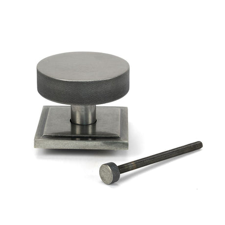 This is an image showing From The Anvil - Pewter Brompton Centre Door Knob (Square) available from trade door handles, quick delivery and discounted prices