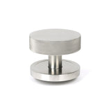 This is an image showing From The Anvil - Satin Marine SS (316) Brompton Centre Door Knob (Plain) available from trade door handles, quick delivery and discounted prices