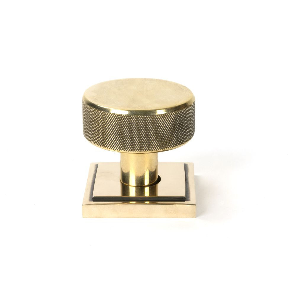 This is an image showing From The Anvil - Aged Brass Brompton Mortice/Rim Knob Set (Square) available from trade door handles, quick delivery and discounted prices