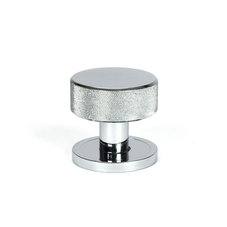 This is an image showing From The Anvil - Polished Chrome Brompton Mortice/Rim Knob Set (Plain) available from trade door handles, quick delivery and discounted prices