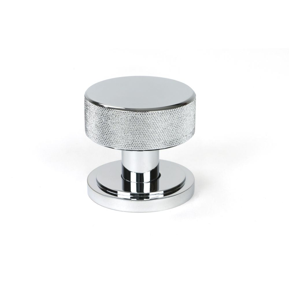 This is an image showing From The Anvil - Polished Chrome Brompton Mortice/Rim Knob Set (Art Deco) available from trade door handles, quick delivery and discounted prices