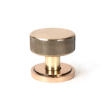 This is an image showing From The Anvil - Polished Bronze Brompton Mortice/Rim Knob Set (Art Deco) available from trade door handles, quick delivery and discounted prices