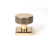 This is an image showing From The Anvil - Polished Bronze Brompton Mortice/Rim Knob Set (Square) available from trade door handles, quick delivery and discounted prices