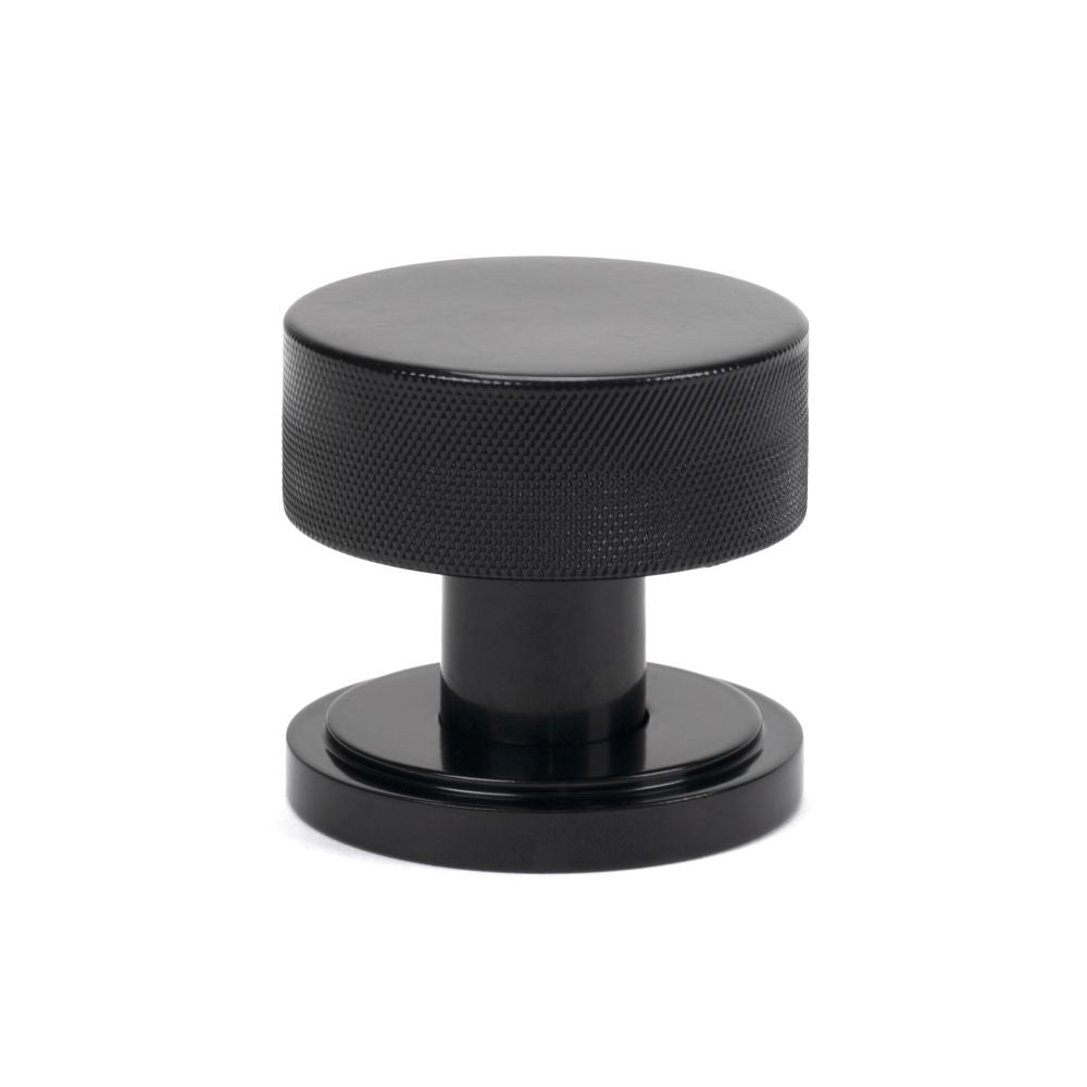 This is an image showing From The Anvil - Black Brompton Mortice/Rim Knob Set (Art Deco) available from trade door handles, quick delivery and discounted prices