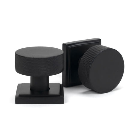 This is an image showing From The Anvil - Matt Black Brompton Mortice/Rim Knob Set (Square) available from trade door handles, quick delivery and discounted prices