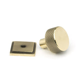 This is an image showing From The Anvil - Aged Brass Brompton Cabinet Knob - 25mm (Square) available from trade door handles, quick delivery and discounted prices