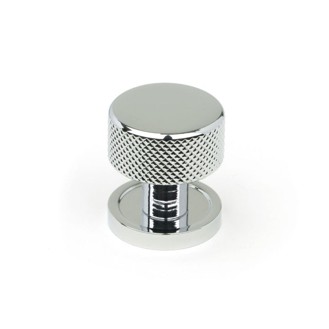 This is an image showing From The Anvil - Polished Chrome Brompton Cabinet Knob - 25mm (Plain) available from trade door handles, quick delivery and discounted prices