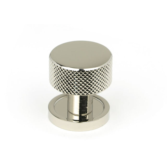 This is an image showing From The Anvil - Polished Nickel Brompton Cabinet Knob - 25mm (Plain) available from trade door handles, quick delivery and discounted prices