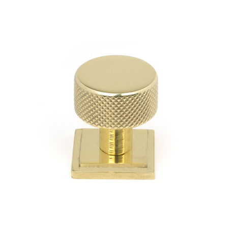 This is an image showing From The Anvil - Polished Brass Brompton Cabinet Knob - 25mm (Square) available from trade door handles, quick delivery and discounted prices