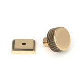 This is an image showing From The Anvil - Polished Bronze Brompton Cabinet Knob - 25mm (Square) available from trade door handles, quick delivery and discounted prices