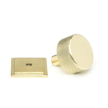 This is an image showing From The Anvil - Polished Brass Brompton Cabinet Knob - 32mm (Square) available from trade door handles, quick delivery and discounted prices