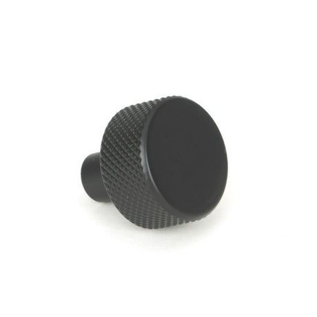 This is an image showing From The Anvil - Matt Black Brompton Cabinet Knob - 25mm (No rose) available from trade door handles, quick delivery and discounted prices