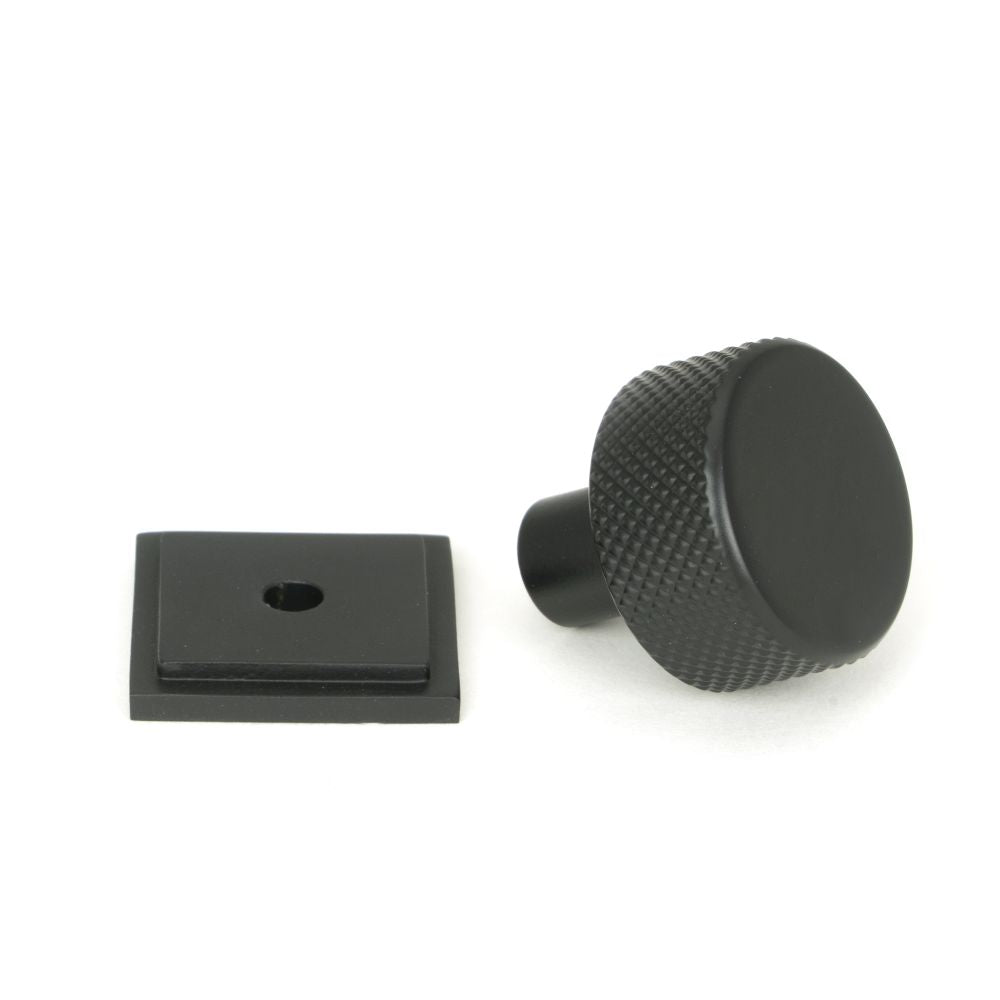 This is an image showing From The Anvil - Matt Black Brompton Cabinet Knob - 25mm (Square) available from trade door handles, quick delivery and discounted prices