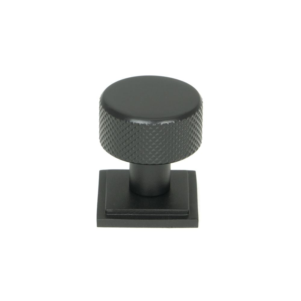 This is an image showing From The Anvil - Matt Black Brompton Cabinet Knob - 25mm (Square) available from trade door handles, quick delivery and discounted prices