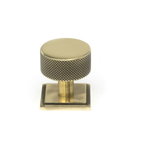 This is an image showing From The Anvil - Aged Brass Brompton Cabinet Knob - 32mm (Square) available from trade door handles, quick delivery and discounted prices