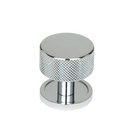 This is an image showing From The Anvil - Polished Chrome Brompton Cabinet Knob - 32mm (Plain) available from trade door handles, quick delivery and discounted prices