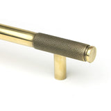 This is an image showing From The Anvil - Aged Brass Half Brompton Pull Handle - Medium available from trade door handles, quick delivery and discounted prices