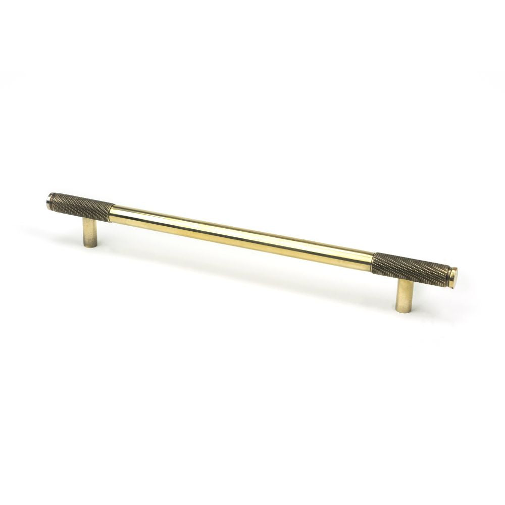 This is an image showing From The Anvil - Aged Brass Half Brompton Pull Handle - Large available from trade door handles, quick delivery and discounted prices