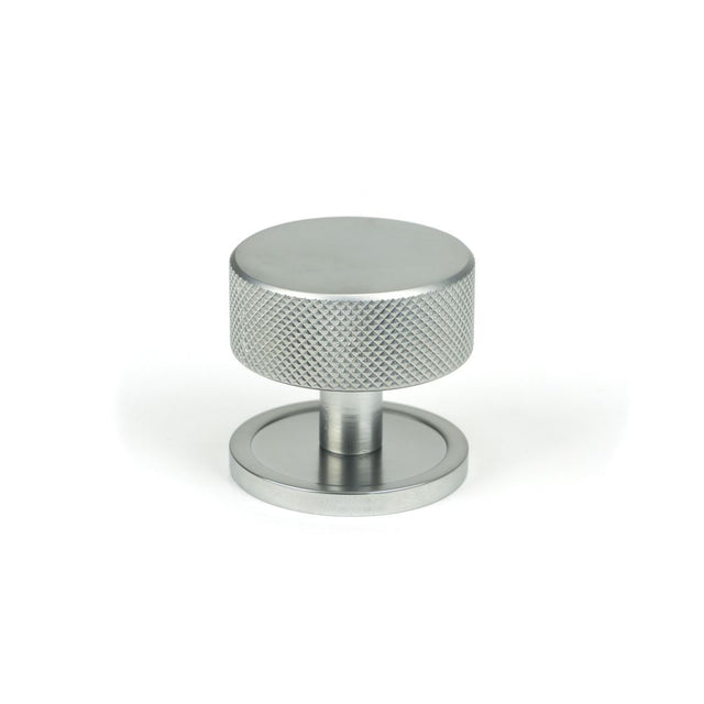 This is an image showing From The Anvil - Satin Chrome Brompton Cabinet Knob - 38mm (Plain) available from trade door handles, quick delivery and discounted prices