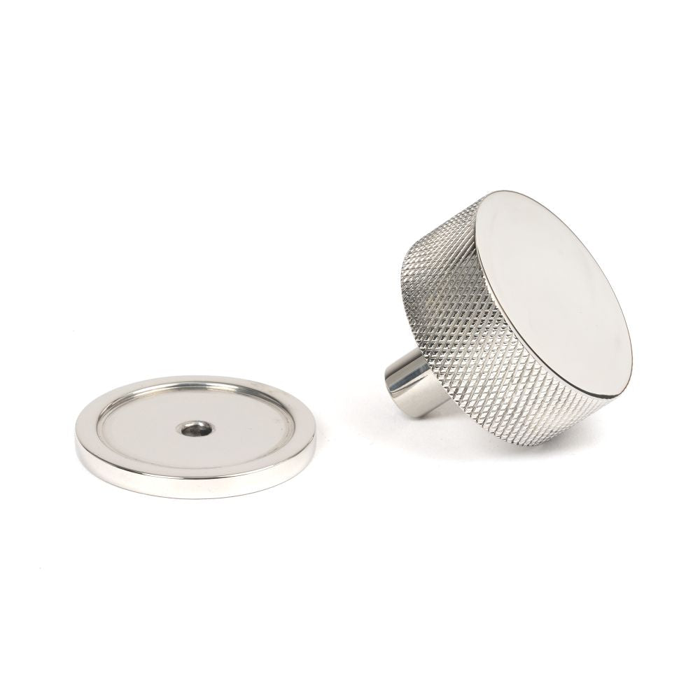 This is an image showing From The Anvil - Polished SS (304) Brompton Cabinet Knob - 38mm (Plain) available from trade door handles, quick delivery and discounted prices