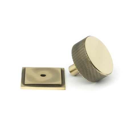 This is an image showing From The Anvil - Aged Brass Brompton Cabinet Knob - 38mm (Square) available from trade door handles, quick delivery and discounted prices