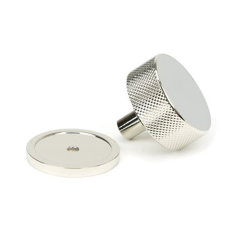 This is an image showing From The Anvil - Polished Nickel Brompton Cabinet Knob - 38mm (Plain) available from trade door handles, quick delivery and discounted prices