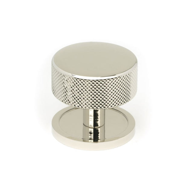 This is an image showing From The Anvil - Polished Nickel Brompton Cabinet Knob - 38mm (Plain) available from trade door handles, quick delivery and discounted prices