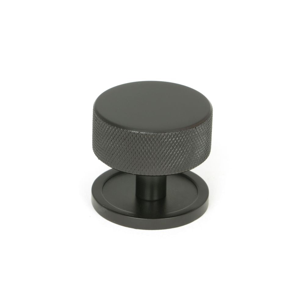 This is an image showing From The Anvil - Aged Bronze Brompton Cabinet Knob - 38mm (Plain) available from trade door handles, quick delivery and discounted prices