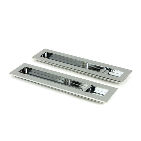 This is an image showing From The Anvil - Polished Chrome 250mm Plain Rectangular Pull - Privacy Set available from trade door handles, quick delivery and discounted prices