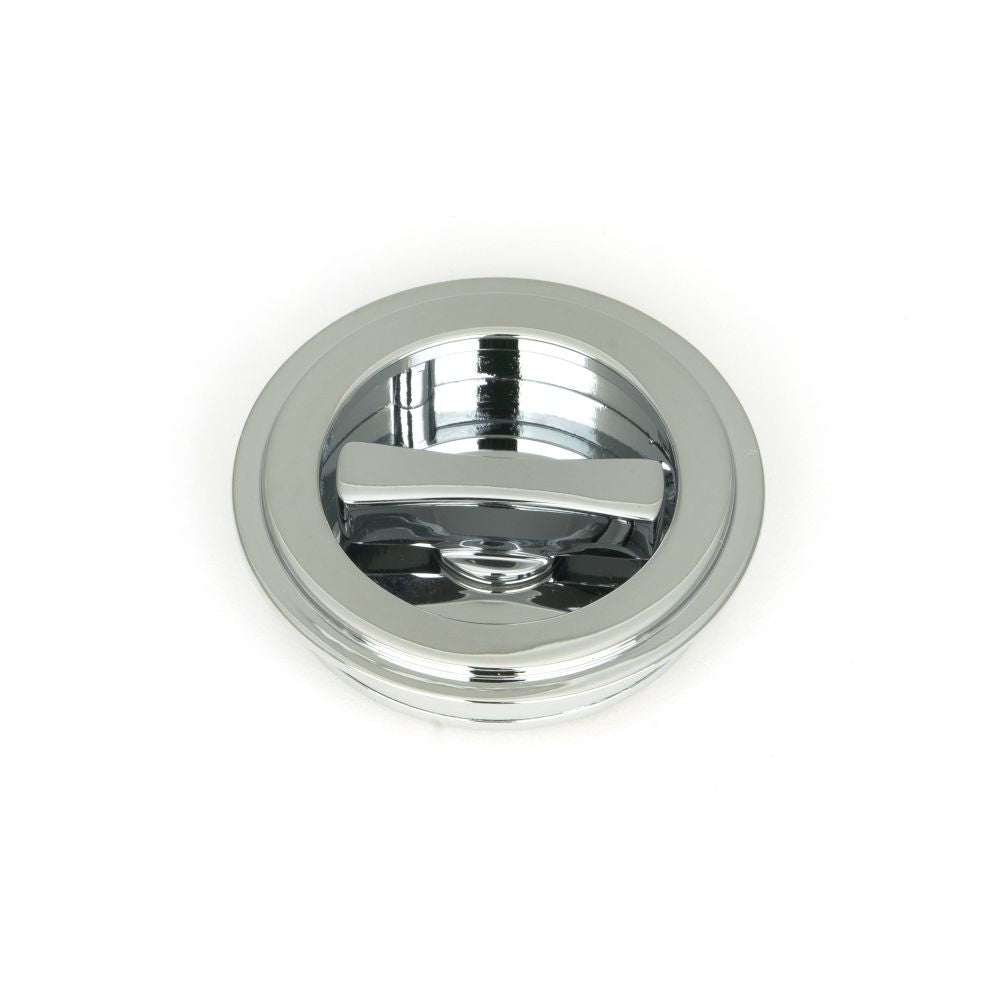 This is an image showing From The Anvil - Polished Chrome 60mm Art Deco Round Pull - Privacy Set available from trade door handles, quick delivery and discounted prices